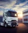 A Renault Trucks available and ready to go in front of a dealership